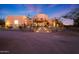Stunning desert home with a large front yard, gated entry, and beautiful landscaping at 5827 N 129Th Ave, Litchfield Park, AZ 85340