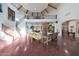 Spacious living room with high ceilings and a grand staircase at 5827 N 129Th Ave, Litchfield Park, AZ 85340