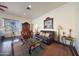 Bright living room with a large leather couch and a coffee table at 5827 N 129Th Ave, Litchfield Park, AZ 85340