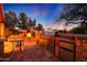 Modern outdoor kitchen with grill and bar at 5827 N 129Th Ave, Litchfield Park, AZ 85340