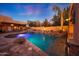 Resort-style pool with spa and fire pit at 5827 N 129Th Ave, Litchfield Park, AZ 85340