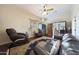 Comfortable sitting area with leather sofas and area rug at 5827 N 129Th Ave, Litchfield Park, AZ 85340