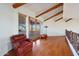 Spacious upper hallway with hardwood floors and access to outdoor balcony at 5827 N 129Th Ave, Litchfield Park, AZ 85340