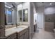 Bathroom with double vanity, large mirror and separate shower at 5857 E Night Glow Cir, Scottsdale, AZ 85266