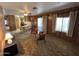 Spacious living room with carpet and two armchairs at 6960 W Peoria Ave # 63, Peoria, AZ 85345