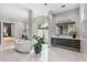 Luxurious bathroom with freestanding tub, large shower, and modern vanity at 7352 E Sage Dr, Scottsdale, AZ 85250