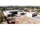 New home aerial view featuring a modern design and pool construction at 7432 E Wethersfield Rd, Scottsdale, AZ 85260