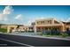 Contemporary home with attached garage and landscaping at 7432 E Wethersfield Rd, Scottsdale, AZ 85260