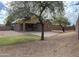 Large backyard with patio and grassy area at 7766 W Myrtle Ave, Glendale, AZ 85303