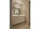 Bright bathroom with single vanity and tiled floor at 8520 W Palm Ln # 1021, Phoenix, AZ 85037