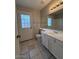 Bathroom features a vanity, toilet, and exterior access at 8520 W Palm Ln # 1021, Phoenix, AZ 85037