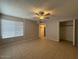 Large bedroom with ceiling fan and spacious closet at 8520 W Palm Ln # 1021, Phoenix, AZ 85037