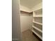 Spacious closet with hanging rod and shelves at 8520 W Palm Ln # 1021, Phoenix, AZ 85037