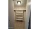 Walk-in closet with built-in shelves at 8520 W Palm Ln # 1021, Phoenix, AZ 85037