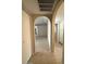 Archway hallway connecting rooms in home at 8520 W Palm Ln # 1021, Phoenix, AZ 85037