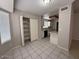 Eat-in kitchen with ample cabinet space and black appliances at 8520 W Palm Ln # 1021, Phoenix, AZ 85037