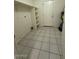 Laundry room with washer/dryer hookups and shelving at 8520 W Palm Ln # 1021, Phoenix, AZ 85037