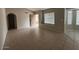 Spacious living room with tile floors and neutral walls at 8520 W Palm Ln # 1021, Phoenix, AZ 85037