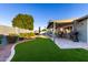 Landscaped backyard with a swimming pool and patio at 902 W Curry St, Chandler, AZ 85225