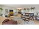 Cozy living room with leather furniture and a fireplace at 928 S 79Th Pl, Mesa, AZ 85208