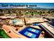 Active community boasting golf, pickleball, pools, and beautiful desert landscaping with scenic mountain views at 949 S 79Th Way, Mesa, AZ 85208