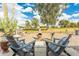 Relaxing backyard with fire pit and comfortable seating at 949 S 79Th Way, Mesa, AZ 85208