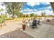 Spacious backyard patio with seating area and desert landscaping at 949 S 79Th Way, Mesa, AZ 85208
