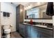 Modern bathroom with double vanity, granite counters, and updated cabinetry at 949 S 79Th Way, Mesa, AZ 85208