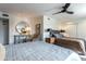 Main bedroom with a king-size bed and ensuite at 949 S 79Th Way, Mesa, AZ 85208