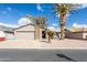 Single story home with a two-car garage and desert landscaping at 949 S 79Th Way, Mesa, AZ 85208