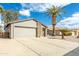 Single story home with two car garage and desert landscaping at 949 S 79Th Way, Mesa, AZ 85208