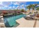 Inviting pool and spa with ample lounge space at 9943 E Sunridge Dr, Sun Lakes, AZ 85248