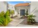 Inviting front entrance with double doors and well-manicured landscaping at 10041 N 52Nd Pl, Paradise Valley, AZ 85253