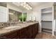 Double vanity bathroom with granite countertops and access to closet at 1300 Coyote Pass --, Carefree, AZ 85377