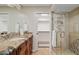 Bathroom with granite countertop, walk-in shower, and large closet at 1300 Coyote Pass --, Carefree, AZ 85377