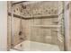 Bathroom with tub, shower, and tiled walls at 1300 Coyote Pass --, Carefree, AZ 85377