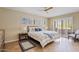 Comfortable bedroom with a bed and access to a balcony at 1300 Coyote Pass --, Carefree, AZ 85377