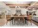 Open dining area with wood beam ceiling and large wooden table at 1300 Coyote Pass --, Carefree, AZ 85377