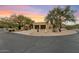 Two-car garage and desert landscaping at sunset at 1300 Coyote Pass --, Carefree, AZ 85377