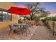 Patio features a table, chairs, and red umbrella at 1300 Coyote Pass --, Carefree, AZ 85377