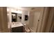 Updated bathroom with gray vanity and a bathtub at 1432 W Emerald Ave # 647, Mesa, AZ 85202
