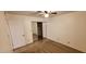 Bedroom with mirrored closet doors and neutral carpet at 1432 W Emerald Ave # 647, Mesa, AZ 85202