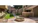 Well-maintained courtyard with brick walkways and lush landscaping at 1432 W Emerald Ave # 647, Mesa, AZ 85202