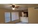 Bright living room with neutral carpeting and sliding glass door at 1432 W Emerald Ave # 647, Mesa, AZ 85202
