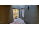 Private patio access from the living area at 1432 W Emerald Ave # 647, Mesa, AZ 85202