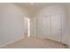 Spacious bedroom with double door closet and carpeting at 1713 W Morse Dr, Anthem, AZ 85086