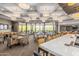 Bright and airy community room with bar and seating at 1713 W Morse Dr, Anthem, AZ 85086