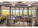 Community room with tables, chairs, and scenic view at 1713 W Morse Dr, Anthem, AZ 85086