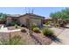 Front view of a house with a well-manicured yard at 1713 W Morse Dr, Anthem, AZ 85086