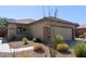 Single-story home with desert landscaping and two-car garage at 1713 W Morse Dr, Anthem, AZ 85086
